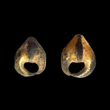 a-bactrian-bronze-ear-ornament-in-the-form-of-a-stylized-ram's-head_05890b