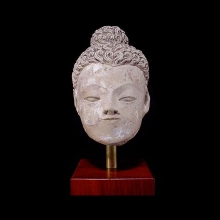 a-gandharan-sunbaked-earthenware-head-of-buddha_08548a