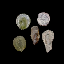 a-group-of-5-(five)-early-islamic-glass-vessel-stamps_08539b