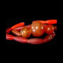 a-strand-of-old-glass-trade-beads-with-beautiful-orange_t6180c