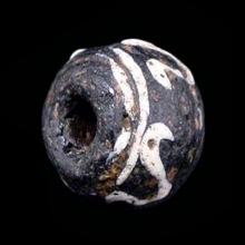 an-early-islamic-glass-bead_-e2093c