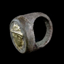 an-indo-greek-gold-and-silver-ring-the-bezel-depicting-the-bactiran-ruler-antimachos-i_x7488c