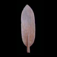 an-old-mimika-canoe-paddle,-the-blade-with-carved-abstract-designs-on-one-surface_t2473c