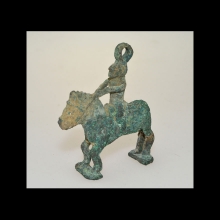 greek-bactrian-bronze-pendant-amulet-in-the-form-of-a-horse-and-rider_x9254b
