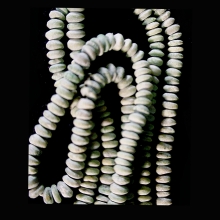 hansalu-miniature-faience-disc-shaped-beads-strung-as-a-necklace_e8079c
