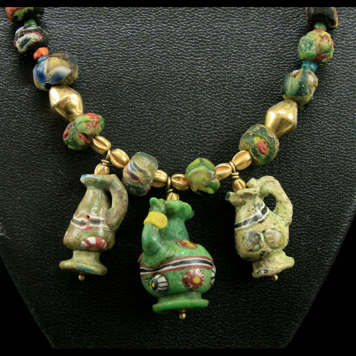 Islamic : A fine Persian and Roman-Egyptian glass bead necklace with ...